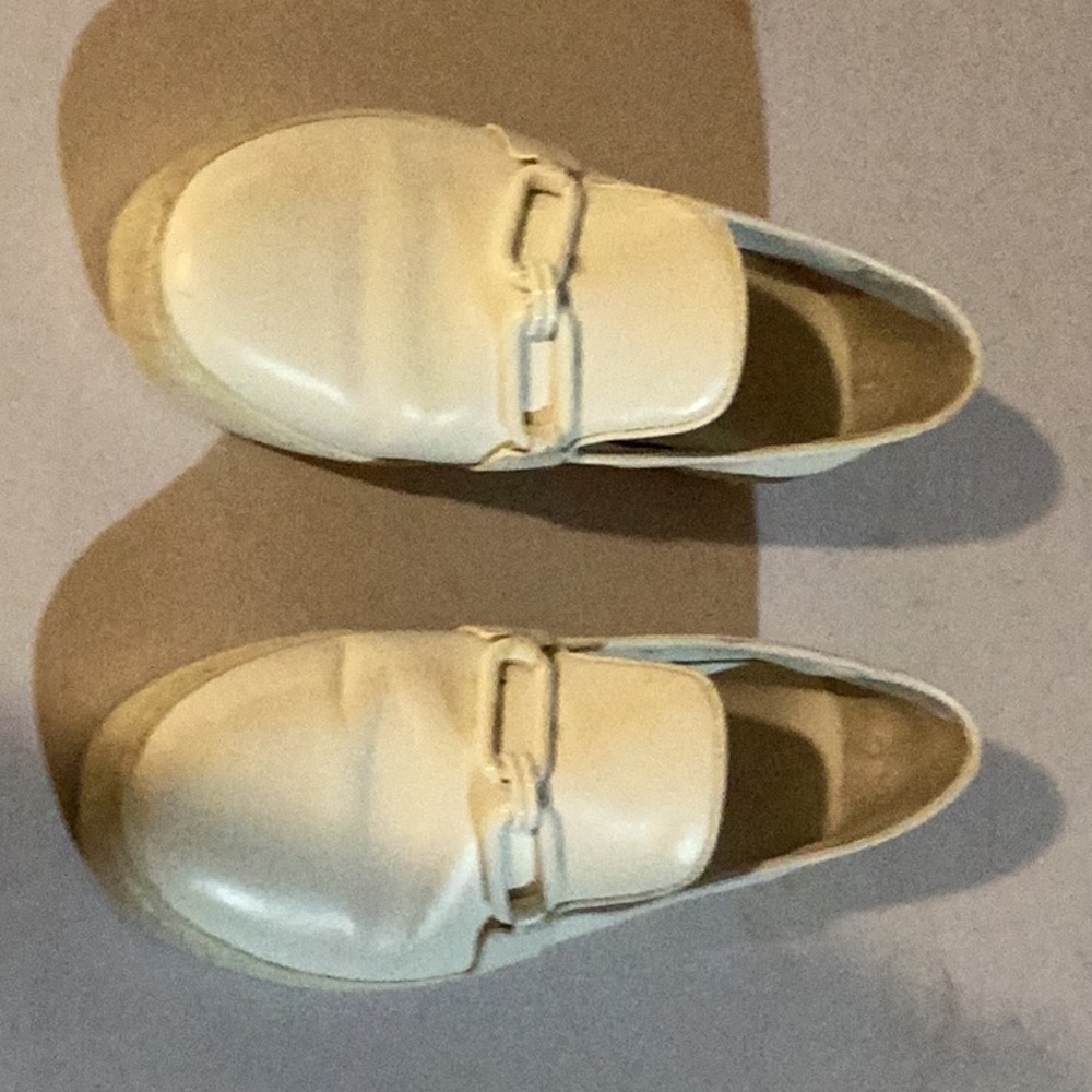 Very nice soft leather lightly worn Michael Kors white leather shoes with chain.